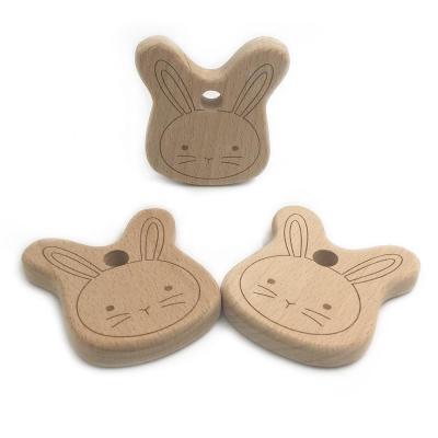 China Chewable DIY Hand Cut Wooden Teether Toys Natural Beech Wood Bunny Eco-Friendly Baby Teether Product Cute Opener Decorative for sale