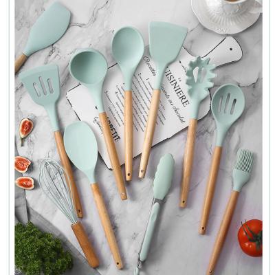 China 2021 New Products Sustainable Sustainable Bakeware Heat Resistant Silicone Set Comfortable Wooden Handle Cooking Kitchen Tool Kit for sale