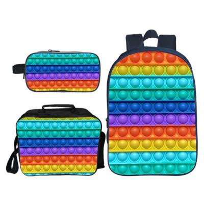 China Relieve Stress Rainbow Push Bubble Pop Meal Bags Stationery Bags Backpack Three Set Trigger Anti Anxiety Toys Kids School Bags for sale