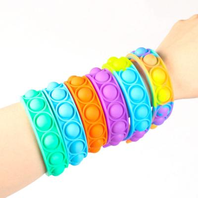 China 2021 Safety Rainbow Push Bubble Noise Game Stir Toy Popper Stress Relief Anti Worry Toys Decompression Sports Sensory Wristband for sale