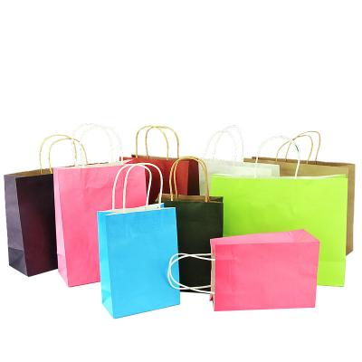 China Hot Selling Recyclable Professional Factory Kraft Paper Clothing Shopping Strong Bearer Gift Tote Bags for sale