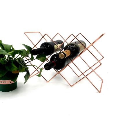 China Home Decorative Rose Gold Modern Metal Steel Wine Stand Wine Rack for sale