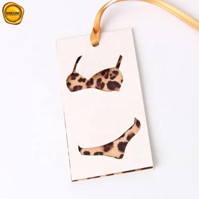 China Sinicline New Viable Popular Design Die Cut Logo Bikini Labels Clothing Hang Tag Swimwear Hang Tags for sale