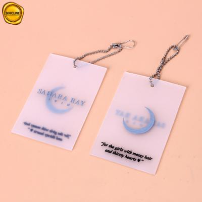 China Sinicline Sustainable Luxury Soft Silicone Hang Tags With Embossed Logo For Swimwear for sale