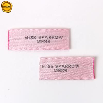 China Sinicline Clothing Labels Sustainable Newcomer High Density Pink Custom Satin Woven Label Straight for sale