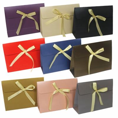 China Handmade Luxury Folding Apparel Gift Box With Ribbon Magnetic Logo Custom Elegant Gift Box Custom for sale