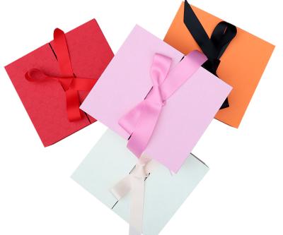 China Moq Small Disposable Kraft Paper Gift Box Fo Paper Box Simple Elegant Pink Package for sale