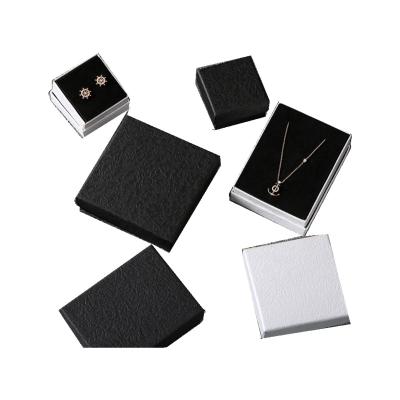 China Handmade pure color small jewelry packaging box black and white fresh paper jewelry box with logo for sale