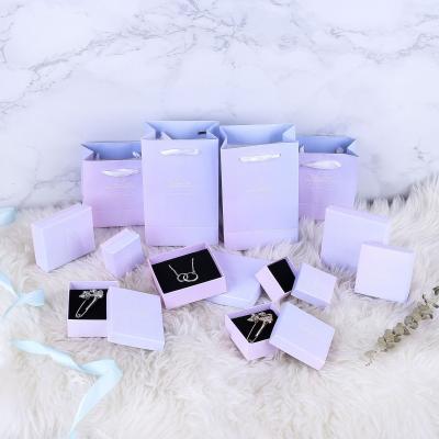 China Handmade White Jewelry Packaging Pouch And Box Cases For Jewelry Packing Pink Blue Gradient Jewelry Box for sale