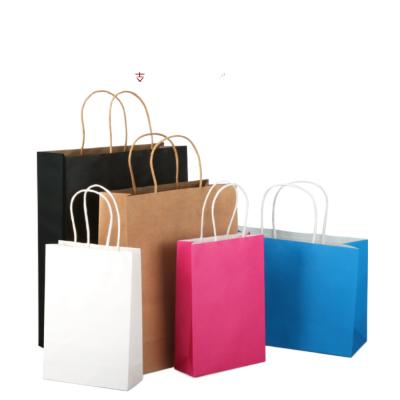 China Handmade Custom Luxury Apparel Packing Pink Gift Bag Shopping Packaging Paper Bags With Handles For Clothes for sale