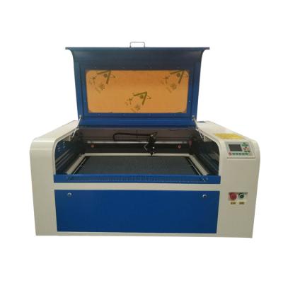 China Hot Selling Laser Cutter CNC 100w Fabric Clothing PVC 6090 Acrylic Plastic Laser Cutting Machine for sale