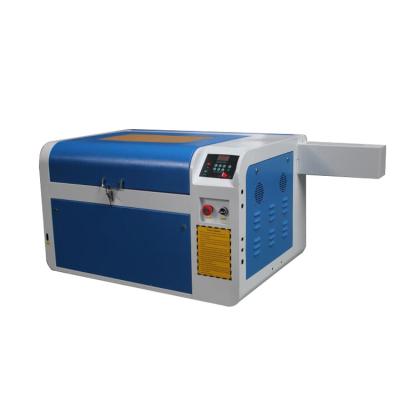 China Laser Engraving Laser Cutting Control Board Engraving Machine 60w 80w 6040 Jade 40w Laser Marble Engraving Machine for sale