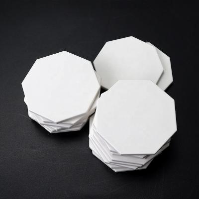 China Eco-friendly Professional Octagon Ceramic White Poker Chips 13g White Chips Any Logo Customizable Box Printed On Chips For Casino Games for sale