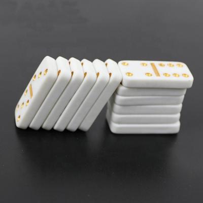 China Melamine & Urea Professinal Custom Cheap Small Dominoes Double Six Domino Sets For White Tile With Gold And Yellow Dot for sale