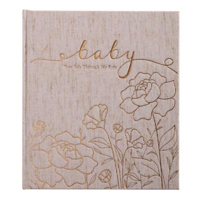 China Custom Hardcover Journal Printing Hardcover Book Gold Foil Stamping Floral Logo Canvas Cover Lined Baby Journal Planner for sale