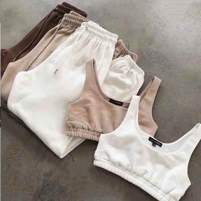 China 2021 Anti-wrinkle women custom logo joggers 2 pieces crop top two pieces of pants set for sale