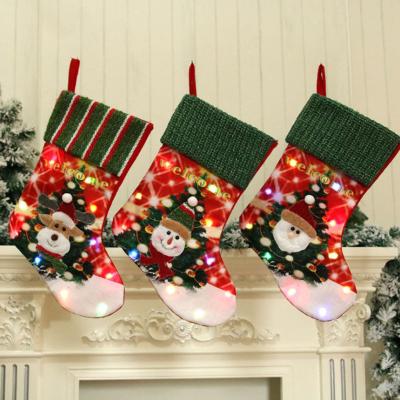 China Simple 2021 Christmas Party Ornaments LED Christmas Stockings for sale