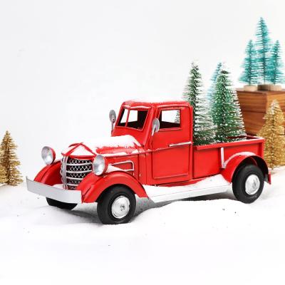 China Iron Christmas Metal Crafts Kids Toy Navidad Vintage Christmas Red Metal Truck With Christmas Tree Decoration for sale