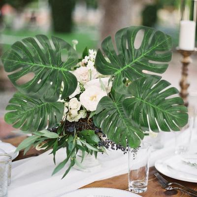 China Home Decor Hawaiin Party Luau Party or Tropical Island Style Big Pool Party Monstera Leaves Dry Palm Artificial Leaves for Wedding for sale