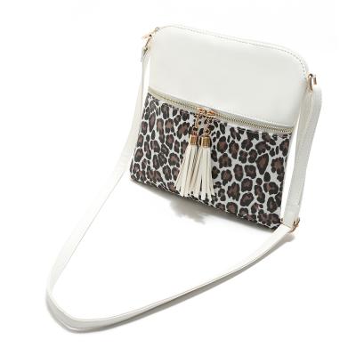 China Wholesale Multifunctional Leopard Personalized Tassel Purse Shoulder Bag Women Tassel Cross - Body Bags for sale