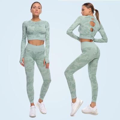 China Breathable Seamless Yoga Clothes Suit High Stretch Knitted Cavity Quick-Dry Fitness Long Sleeve Yoga Two Set for sale