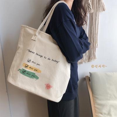 China Fashion Durable Hot Selling Outdoor Travel Shoulder Straps Letter Printing Women Ladies Pool Large Capacity Cotton Canvas Beach Tote Bag for sale