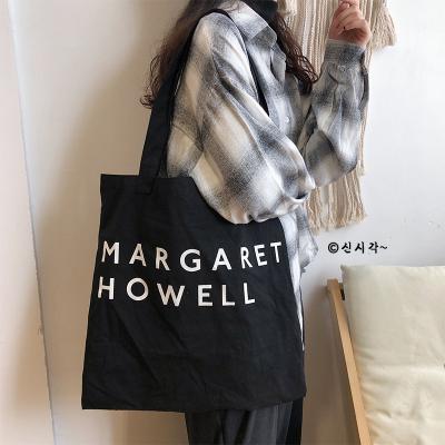 China Hot Sale Fashion Design Print Letter Style Eco-friendly Single Shoulder Black For Women Canvas Gift Shopping Cotton Tote Bag for sale