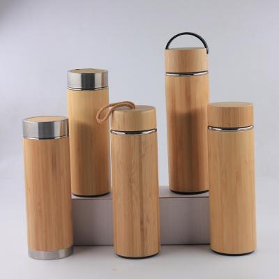 China Sustainable Water Bottle Manufacturers Bamboo Flask 500ml With Portable Lid for sale