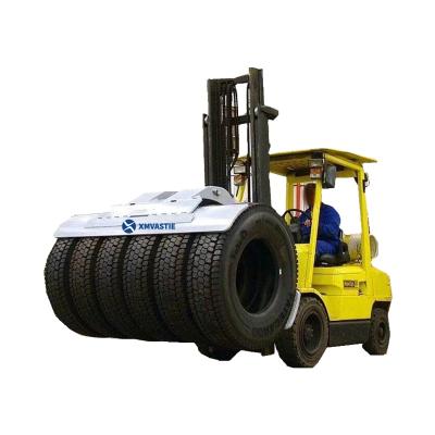 China 2021 New Design High Quality Convenience Safety Operation Forklift Attachment Equipment Equipment Easy Tire Revolving Hydraulic Clamp For Industry Factory for sale