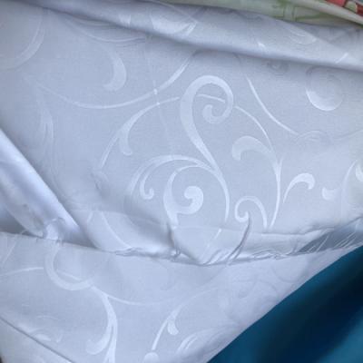 China Shrink-Resistant Pure Color Embossed Fabric High Quality 100% Polyester Bed Sheet Fabric for sale