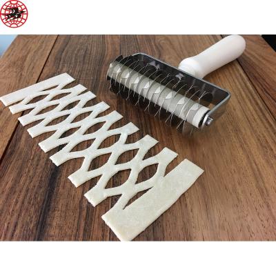 China Sustainable Kitchen Supplies Dough Roller Lattice Craft Pizza Baking Tools for sale