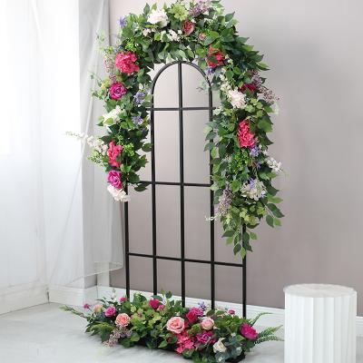 China Arch flower row flower and vine decoration set wall decoration set hand made wedding plant vines road guide flower wedding arch flower row shelter pipe shelter for sale