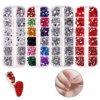 China Easy Apply Nail Art Boxed Set Crystal Glass 3D Nail Art Designs Flat Back Rhinestones 3D Stone Charm Press On Nails for sale