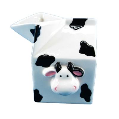 China Viable Unique Cute Cow Design Ceramic Milk Jug Custom Milk Pitcher With Logo for sale