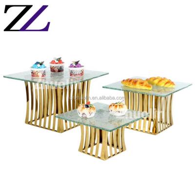 China Viable Decorative Stainless Steel 3 Tiers Wedding Gold Brass Cake Stand Set For Dessert Table Dessert Clear Glass Display Stand for sale