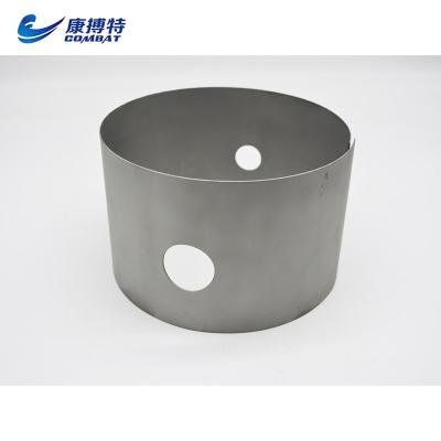 China Rolled Furnace High Purity Tungsten Cylinder With Two Holes Customized Special Shape Parts for sale