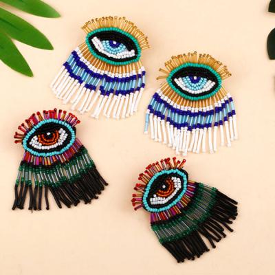 China Handmade quake glass seed beads devil eye charm fringe tassel earrings jewelry women beaded boho for sale