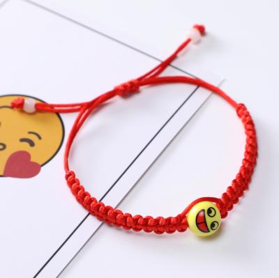 China Handmade Adjustable Smile Face Red Kid String Yarn Rope Good Luck Braided Bracelet Custom Available for sale