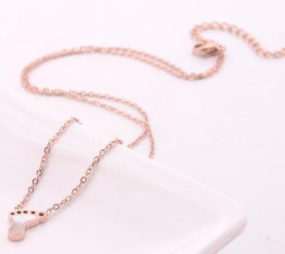 China Small Handmade Titanium Steel Pendant Necklace Feet With Mother Of Shell Pendant 18K Rose Gold Plating for sale