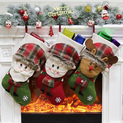 China Soulmate Safe Environmental Material in Christmas Decorations Large Stock Christmas Stockings Elk Plaid Fabric Christmas Socks Special Pattern Christmas Gift Bag for sale