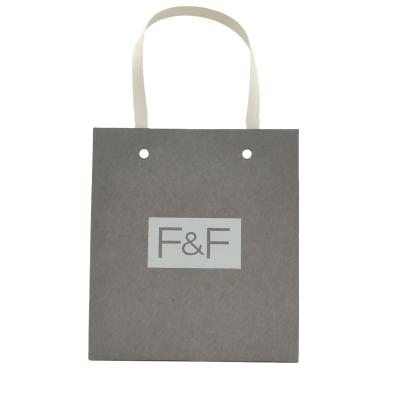 China Eco Recyclable Luxury Custom Recyclable Kraft Paper Packaging Gift Retail Shopping Bags for sale