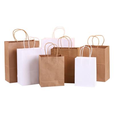 China Wholesale Recycled Recycled Materials Kraft Paper Shopping Paper Bags Custom Engraving Printing Paper Bags With Your Own Logo for sale