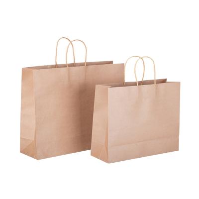 China Recycled Materials Custom Paper Bags With Logo Brown Kraft Paper Shopping Bag for sale