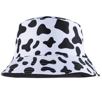 China Reversible Black Image Fashion New Cow Pattern White Bucket Hats Fisherman Hats For Women Summer for sale