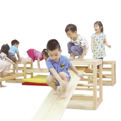 China Kindergarten Non-Toxic Children Playing Equipment Wooden Modular Physical Playsets for sale