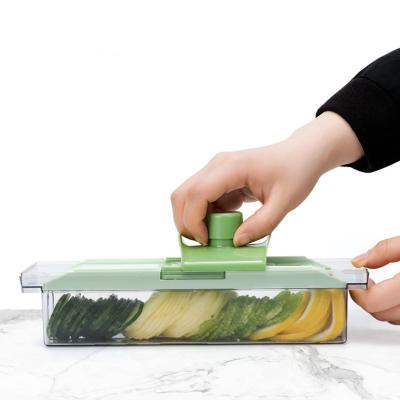 China Household Multifunctional Non-slip Handheld Non-slip Kitchen Fruit Food Manual Vegetable Cheese Grater for sale