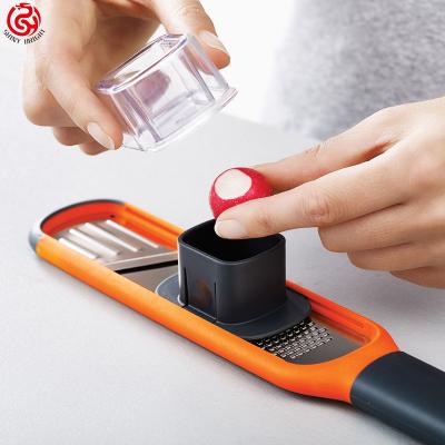 China Viable Custom Multifunctional Vegetable Cutter Kitchen Logo Hand Held Garlic Garlic Ginger Rammer Press Crusher for sale