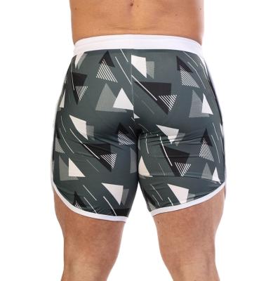 China Plus Size Mens Beach Pants Loose Running Cropped Mesh Quick Drying Camouflage Shorts Tall Pants for sale