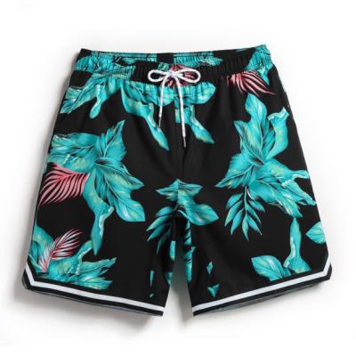 China Vacation Plus Size Beach Elastic Woven Printing Beach Pants Men's Plus-Size Sports Running Board Quick Dry Loose Shorts for sale