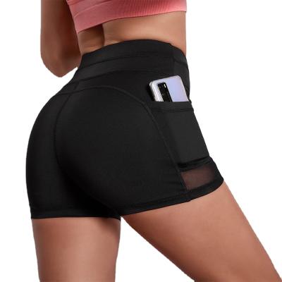 China 2021 new high waist hip breathable lifting sports shorts European women and American pocket tight yoga pants for sale